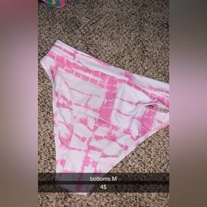 pink and white high waisted bottoms